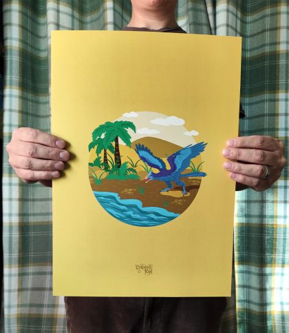 Yellow a3 print with illustration of a blue archeopteryx dinosaur on sandy beach with palm trees.