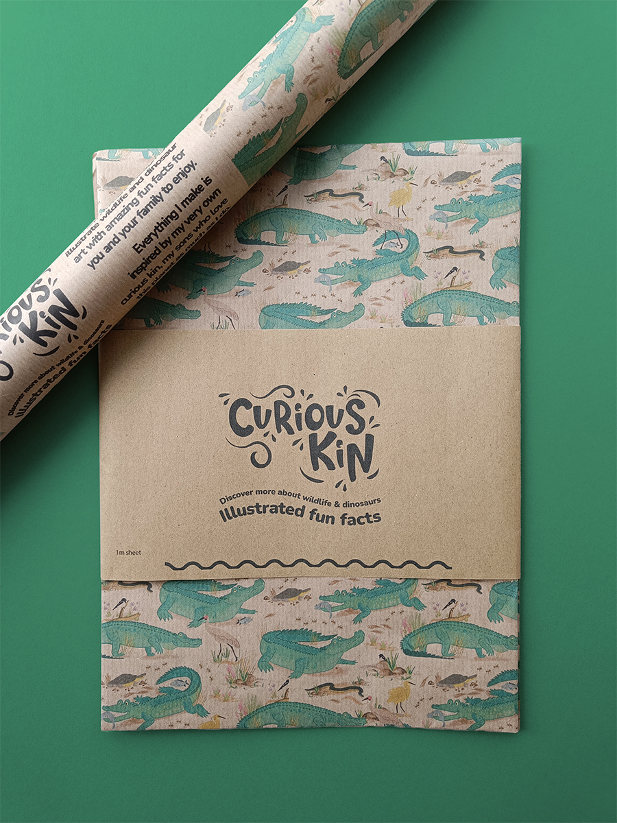 Kakadu Crocs illustrated eco wrapping paper featuring crocodiles, snakes, turtles and wetland birds from Australia printed on brown paper, by Curious Kin.