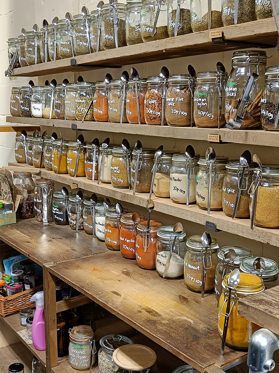 shelves with jars of herbs and spices