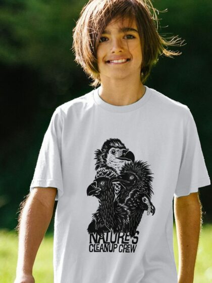 Boy wearing white t-shirt with Curious Kin's natures clean up vultures design printed on it