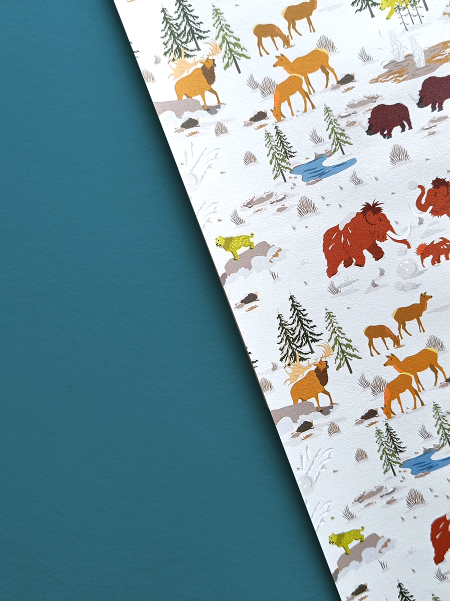 Illustrated ice age gift wrap with mammoths, woolly rhino, smilodon and irish elk.