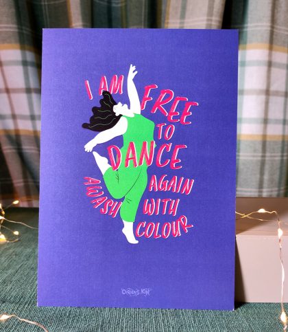 A5 print of a woman dancing, balancing on one leg arms flung back and hair wild in a flourescent greeen outfit on a purple background.