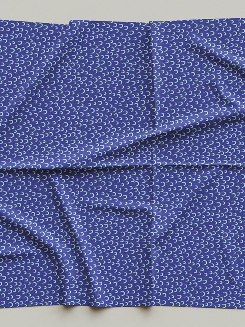 Fabric sample of Curious Kin's indigo arches mini pattern