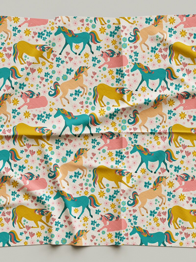 Fabric sample of Curious Kin's of meadow unicorns