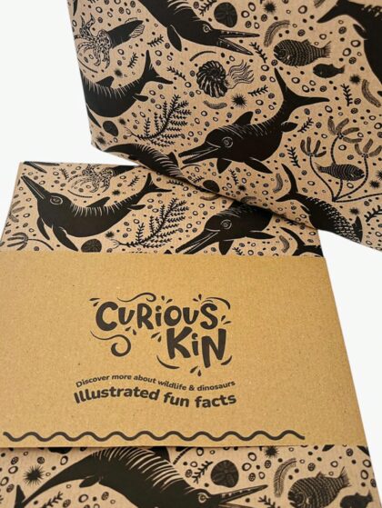 Icthyosaur and prehistoric marine seamless monochrome gift wrap printed on recycled kraft paper