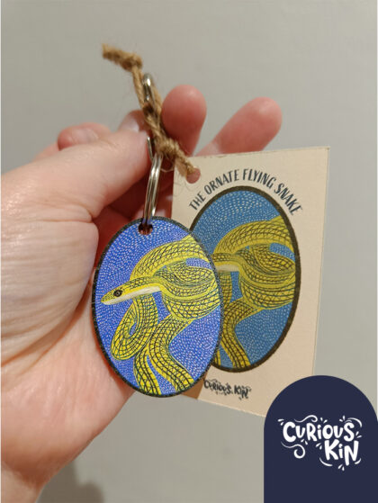 Curious Kin's ornate flying snake keyring