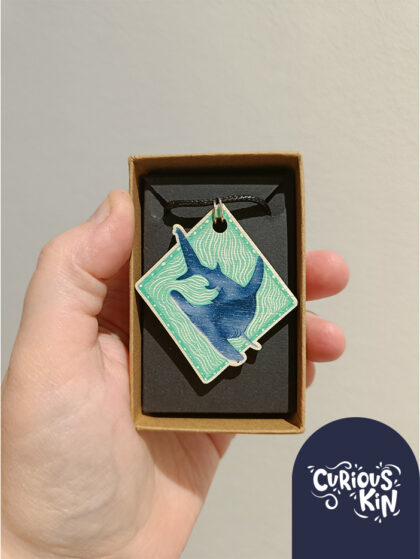 Curious Kin's great hammerhead shark wooden necklace pendant