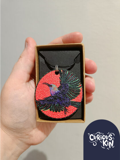 Curious Kin's Palestinian Sunbird Wooden necklace pendant