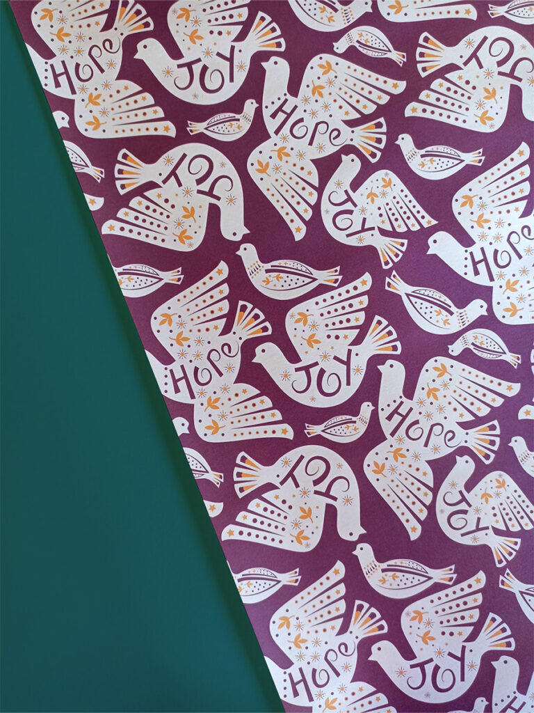 Joy and hope dove paper cut style red, cream and gold tone gift wrap sheet