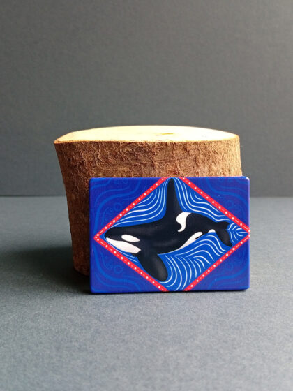 Rectangular illustrated transient orca magnet made from recycled plastic.