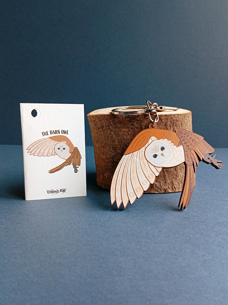 Barn owl shaped keyring made from sustainably sourced wood with matching mini fun fact card