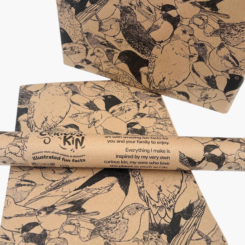 Eco brown wrapping paper with Curious Kin's British Bird design printed across it