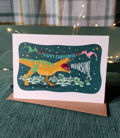 Roaring tee-rex Christmas card with matching Kraft envelope