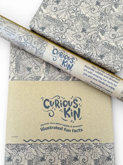 Hand drawn repeating fossils line pattern printed on kraft paper. Shown as folded sheet, roll and gift wrapped.