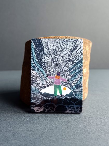 Female explorer in ice cave magnet