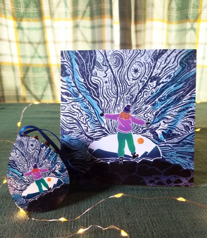 Female explorer in ice cave card and pear shaped wooden dec of same art bundle.