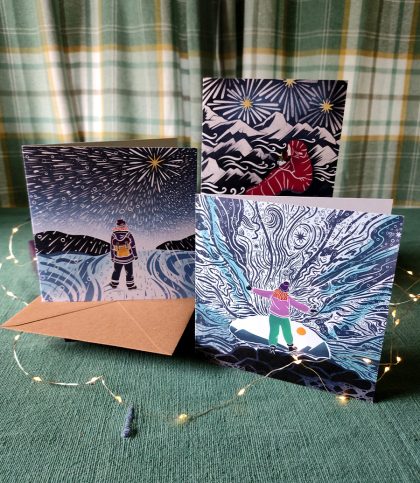 A collection of 3 winter female explorer cards