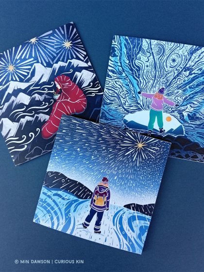 3 illustrated square cards of female explorers in a different settings, one on a mountain top in a sleeping bag surrounded by stars, another balancing on a rock in an ice cave and the third a woman walking in a snow storm under the a bright star.